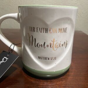 Dwell Studio Ceramic Mug with the saying OUR FAITH CAN MOVE MOUNTAINS